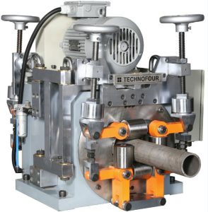 Rotating heads house four probes for inspection of bars and seamless tubes for longitudinal defects